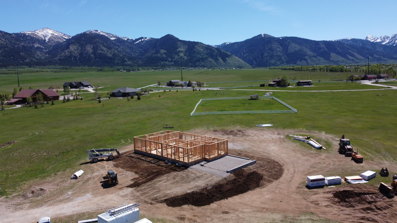 Aerial drone photo of the 109 Teton Way home under framing, May